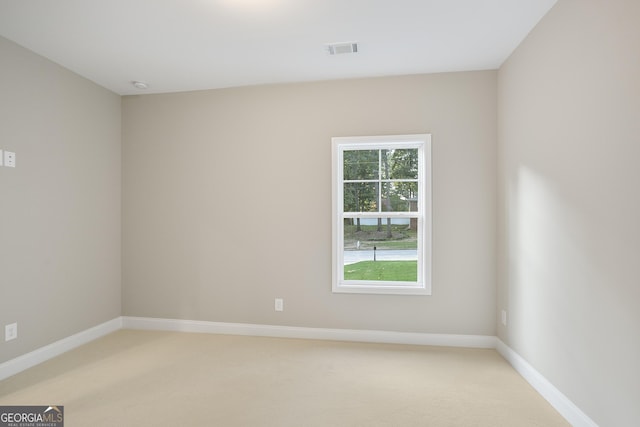 view of carpeted spare room