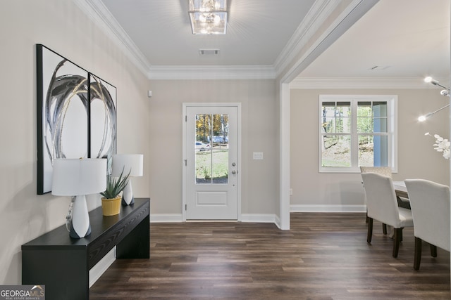 entryway with dark hardwood / wood-style floors and crown molding