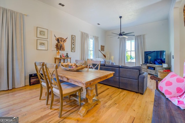 dining room featuring ceiling fan and light wood-type flooring