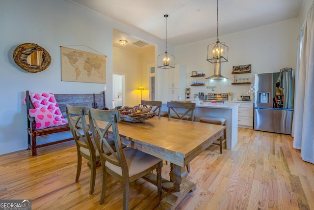 dining area with light wood-type flooring