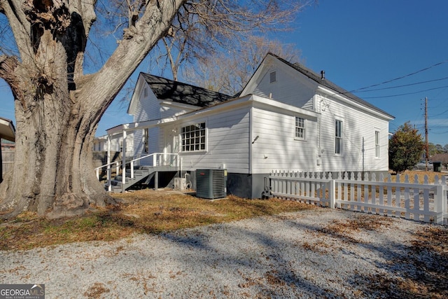 view of property exterior featuring central AC