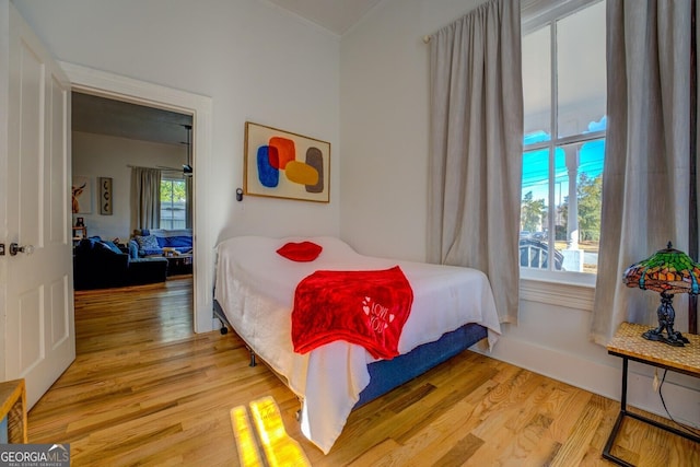 bedroom with light wood-type flooring