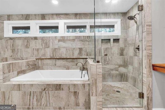 washroom with laundry area, wood walls, wooden ceiling, and a sink