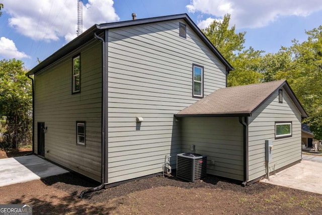 view of home's exterior featuring central AC and a patio area