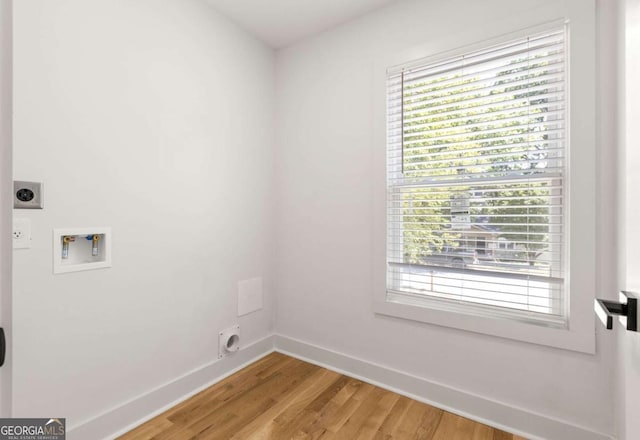 laundry room with washer hookup, hardwood / wood-style floors, and electric dryer hookup