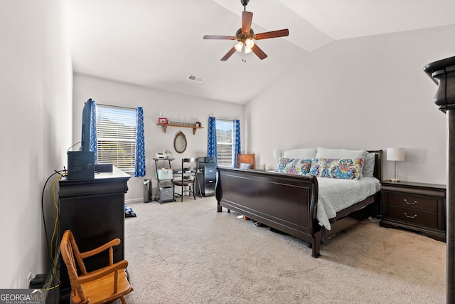 carpeted bedroom featuring ceiling fan and lofted ceiling