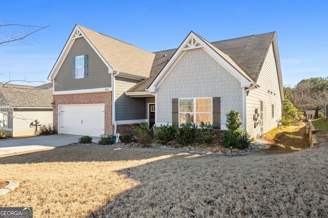 view of front of house with a garage and a front yard