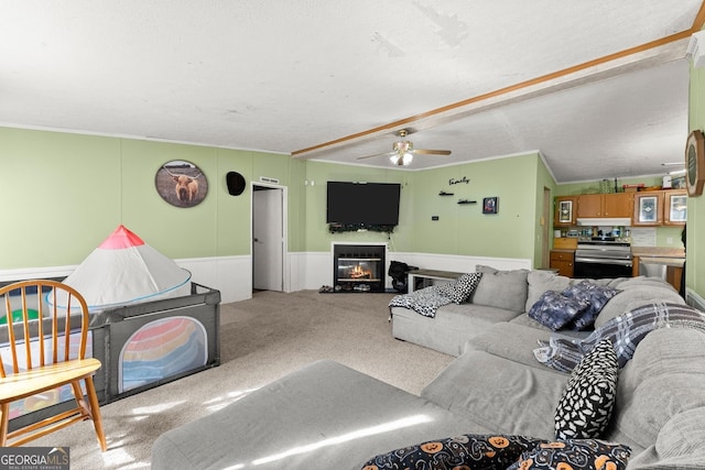 living room featuring light carpet, ceiling fan, and vaulted ceiling