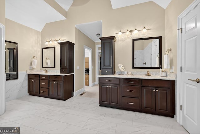 4225 Dunham Park, Flowery Branch, GA 30542 - full bathroom featuring lofted ceiling, marble look tile flooring, vanity, and a shower