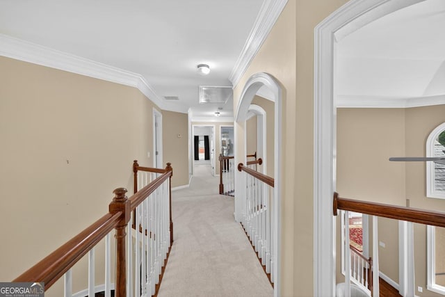 4225 Dunham Park, Flowery Branch, GA 30542 - hallway featuring an upstairs landing, crown molding, and carpet flooring