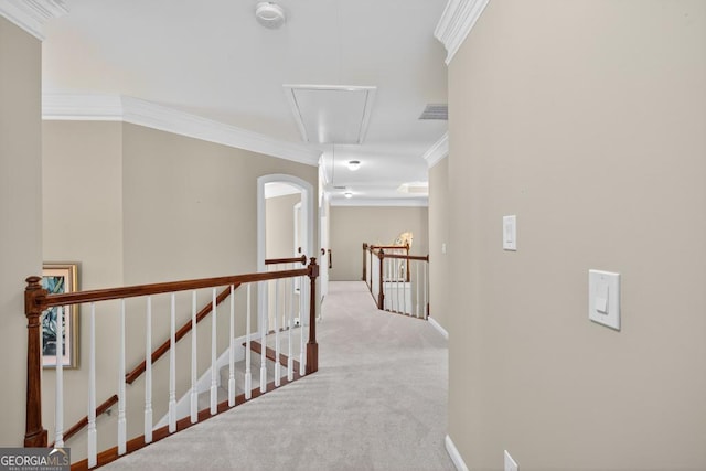 4225 Dunham Park, Flowery Branch, GA 30542 - hallway featuring attic access, an upstairs landing, ornamental molding, and carpet