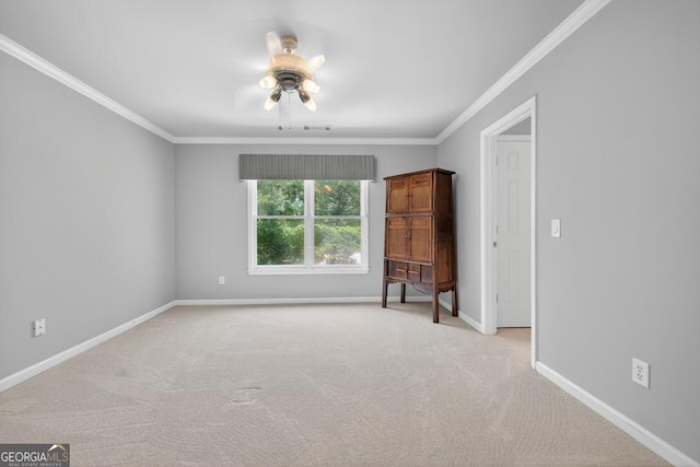 4225 Dunham Park, Flowery Branch, GA 30542 - unfurnished bedroom with crown molding, light carpet, and a ceiling fan