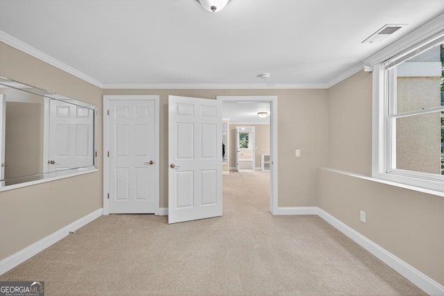 4225 Dunham Park, Flowery Branch, GA 30542 - unfurnished bedroom with light carpet and crown molding