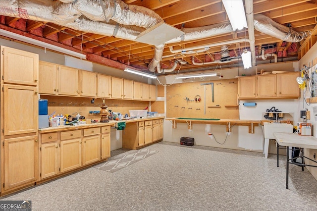 4225 Dunham Park, Flowery Branch, GA 30542 - unfinished below grade area with a workshop area