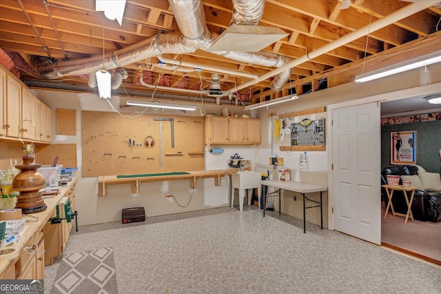 4225 Dunham Park, Flowery Branch, GA 30542 - unfinished below grade area with a workshop area