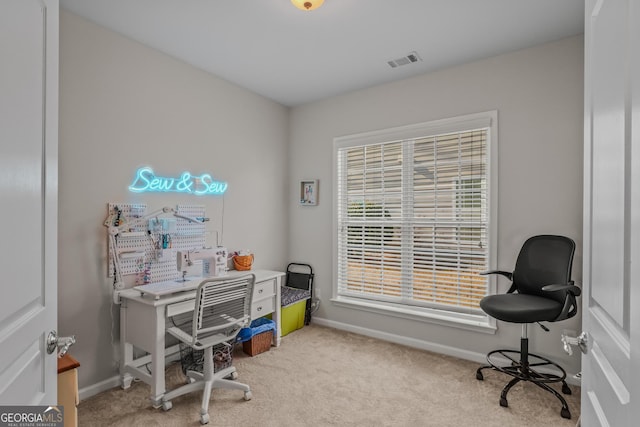 home office with light colored carpet