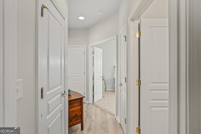 hallway featuring light hardwood / wood-style flooring