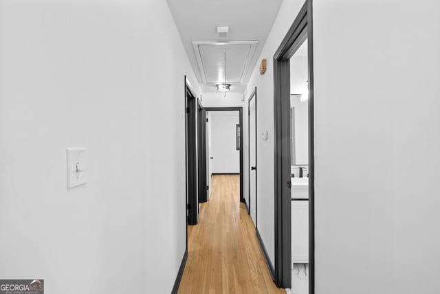 hall featuring light hardwood / wood-style flooring