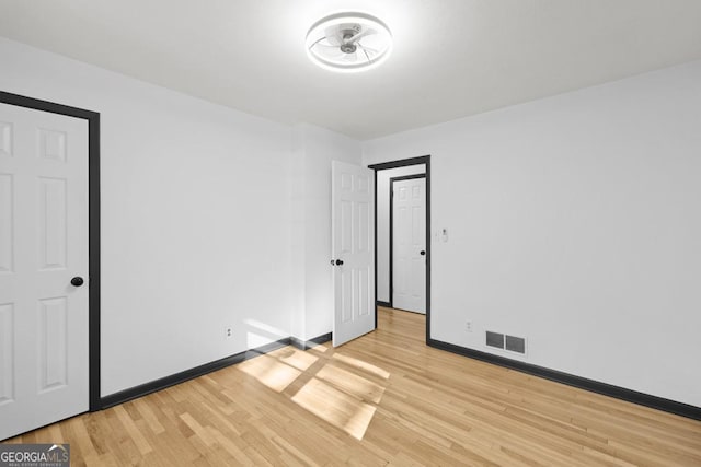 unfurnished bedroom with light hardwood / wood-style floors