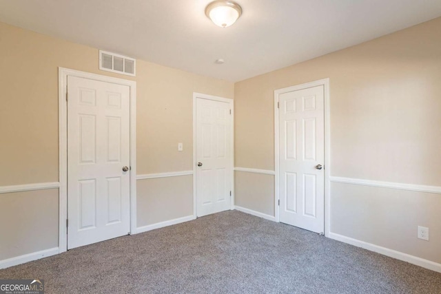 unfurnished bedroom featuring carpet floors