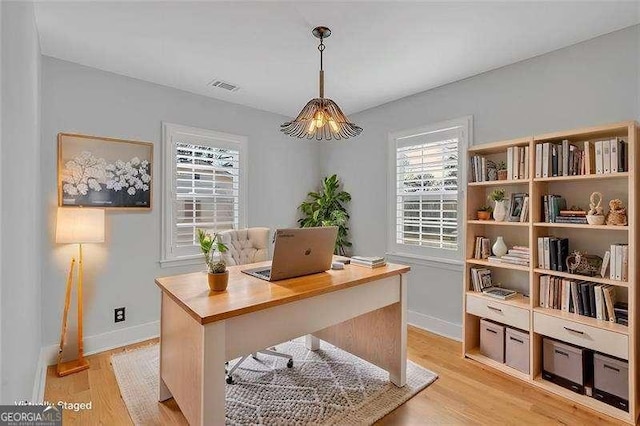 home office featuring light wood-type flooring