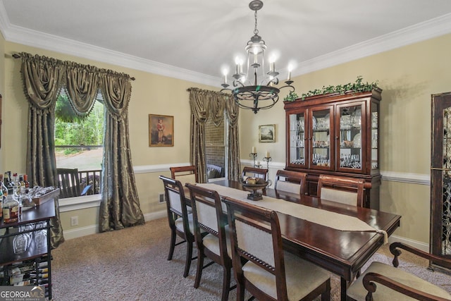 dining room featuring carpet, an inviting chandelier, and ornamental molding