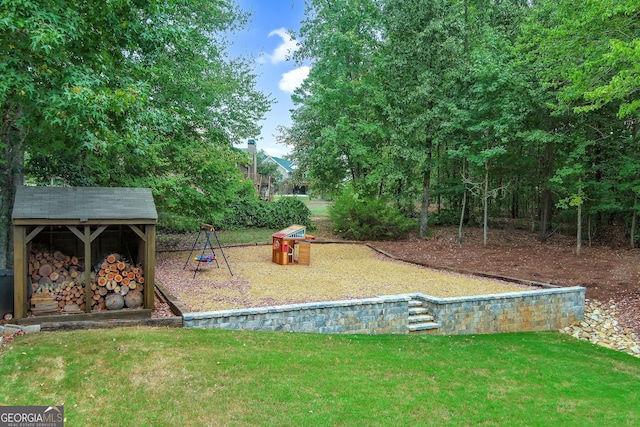 view of play area with a yard