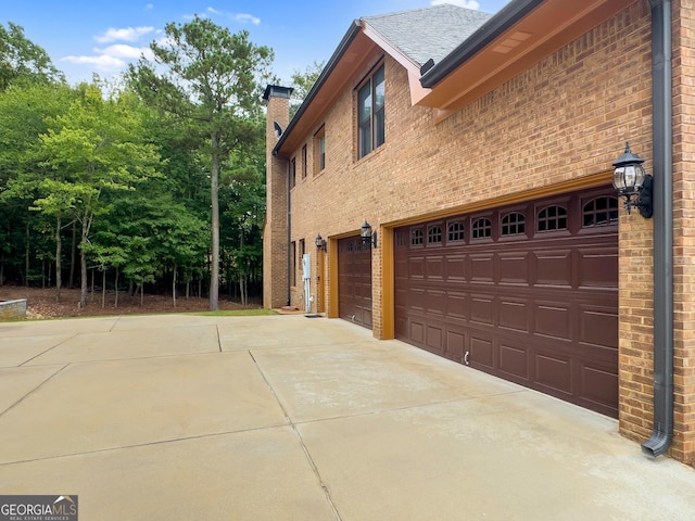 view of home's exterior with a garage