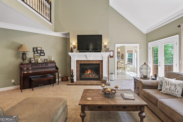 living room featuring high vaulted ceiling, light colored carpet, a fireplace, and ornamental molding