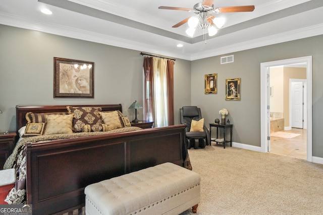 carpeted bedroom with ceiling fan, connected bathroom, and ornamental molding