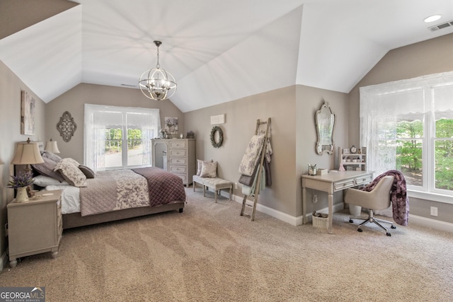 carpeted bedroom featuring lofted ceiling and an inviting chandelier