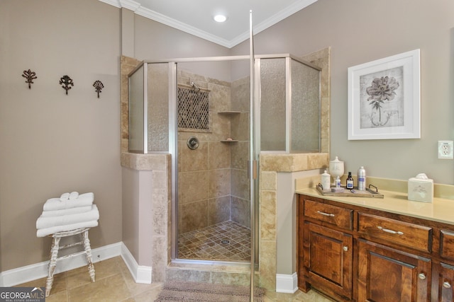 bathroom with vanity, ornamental molding, and an enclosed shower