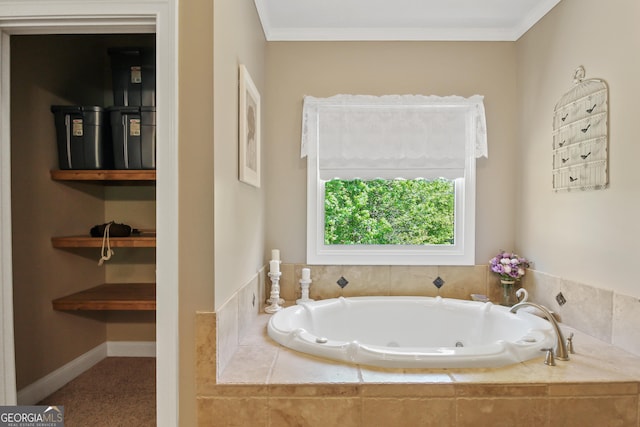 bathroom featuring crown molding and a relaxing tiled tub