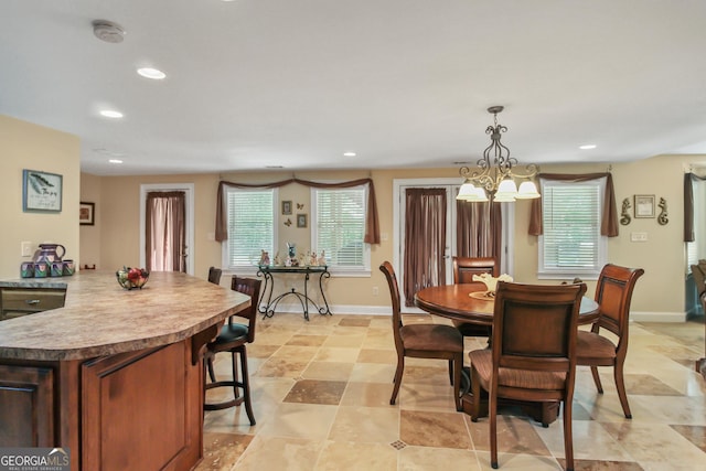 dining room featuring an inviting chandelier