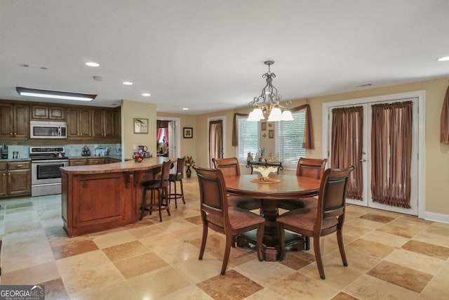 dining room featuring a notable chandelier