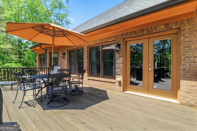 wooden terrace featuring french doors