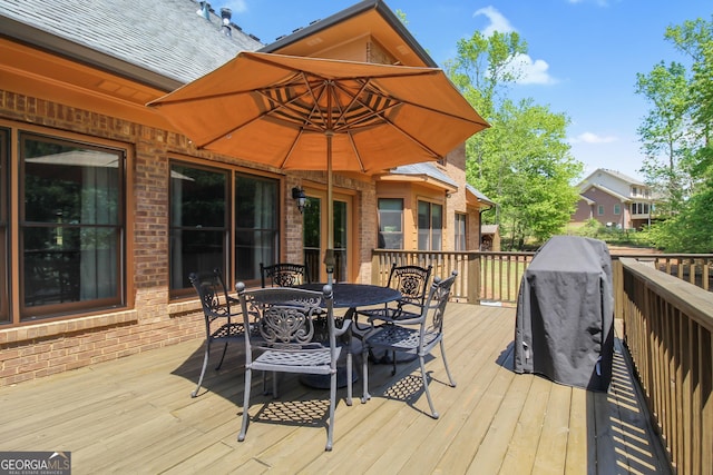 wooden deck with grilling area