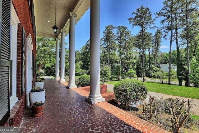 view of patio featuring a porch