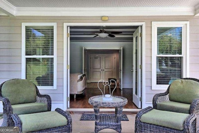 entrance to property with ceiling fan