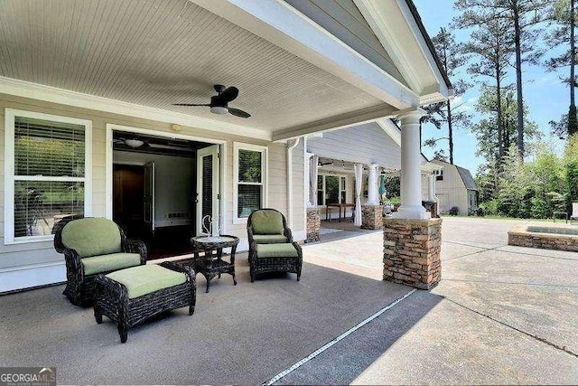 view of patio / terrace featuring ceiling fan