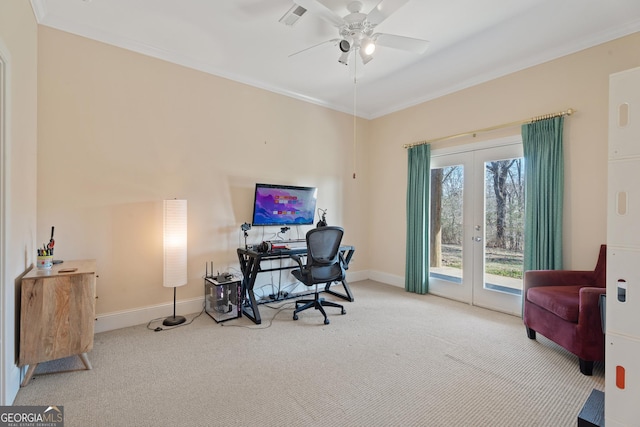 home office with ceiling fan, ornamental molding, light colored carpet, and french doors