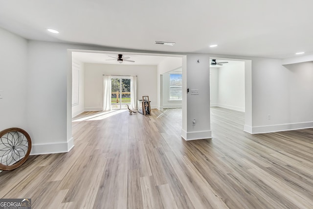 interior space with light hardwood / wood-style floors and ceiling fan