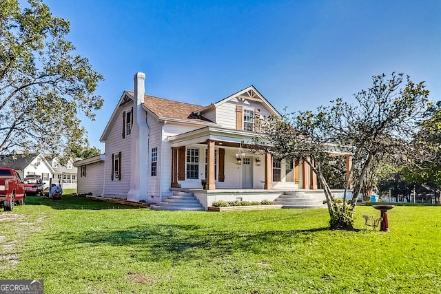 view of front facade featuring a front lawn and a porch