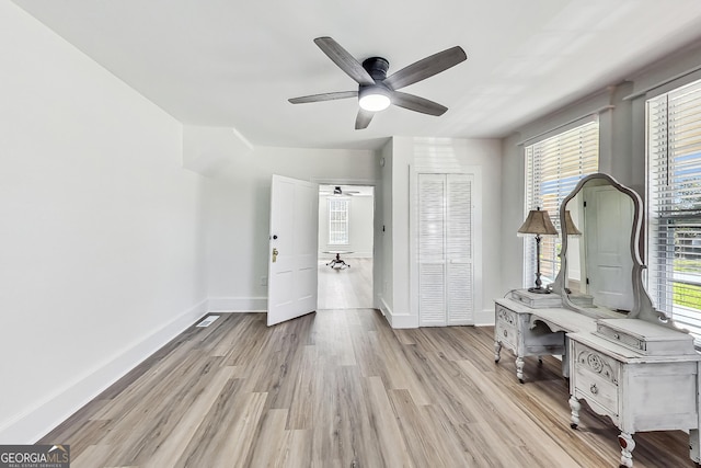 interior space featuring ceiling fan and light hardwood / wood-style flooring