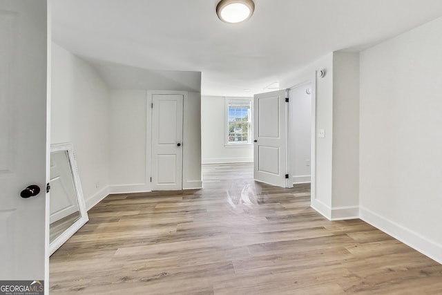 unfurnished room featuring light wood-type flooring