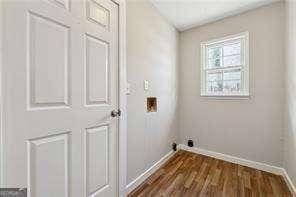 washroom featuring dark hardwood / wood-style flooring