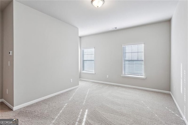 view of carpeted spare room