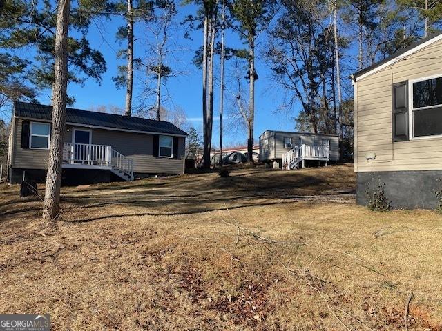view of yard with a deck