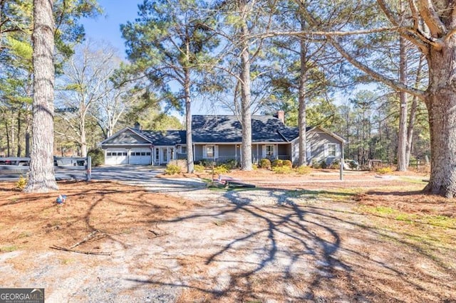 single story home with a garage