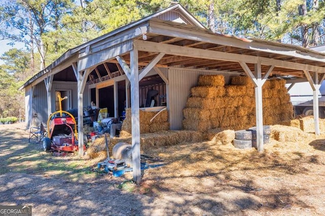 view of property's community featuring an outbuilding